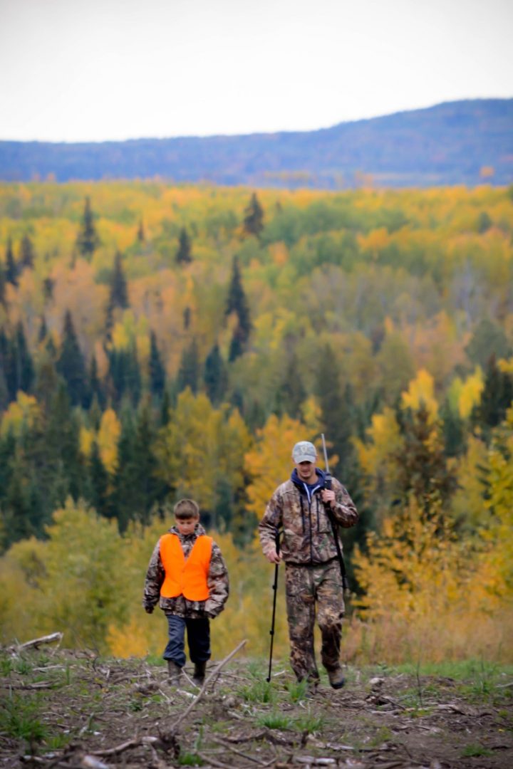 man and boy hunting in woods - fall fun in gp and region