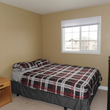 Bedroom at Fresh Coast Investments in Grande Prairie, Alberta.