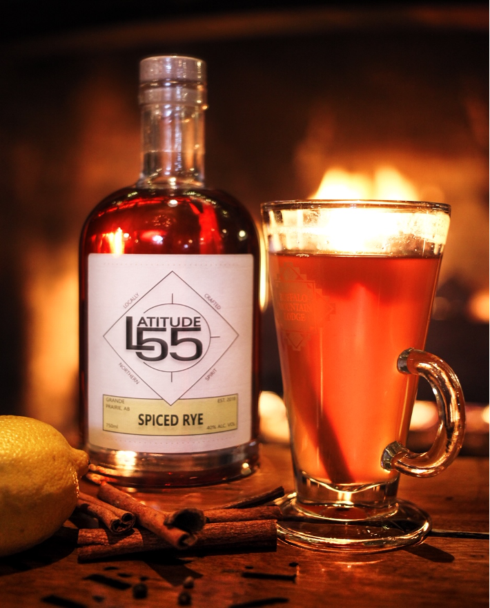 Latitude 55 spiced rye bottle and hot toddy drink