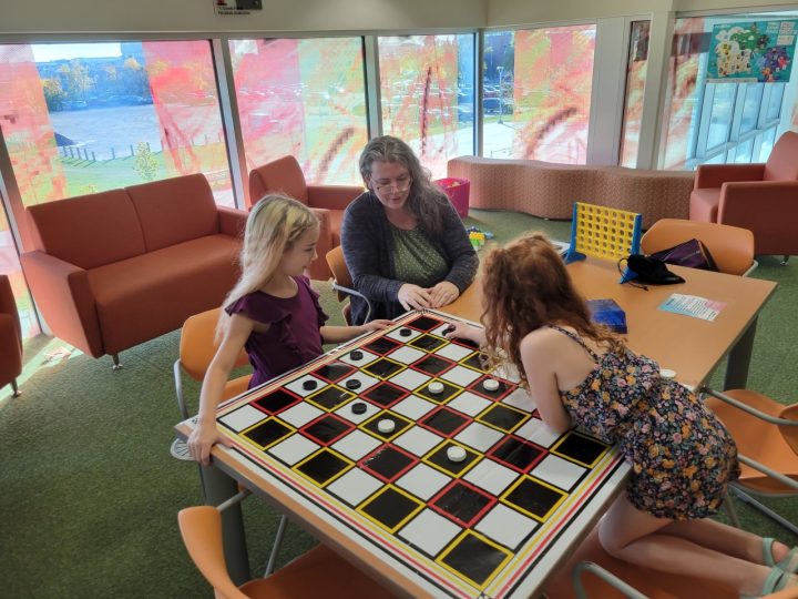 Playing checkers at Grande Prairie Public Library