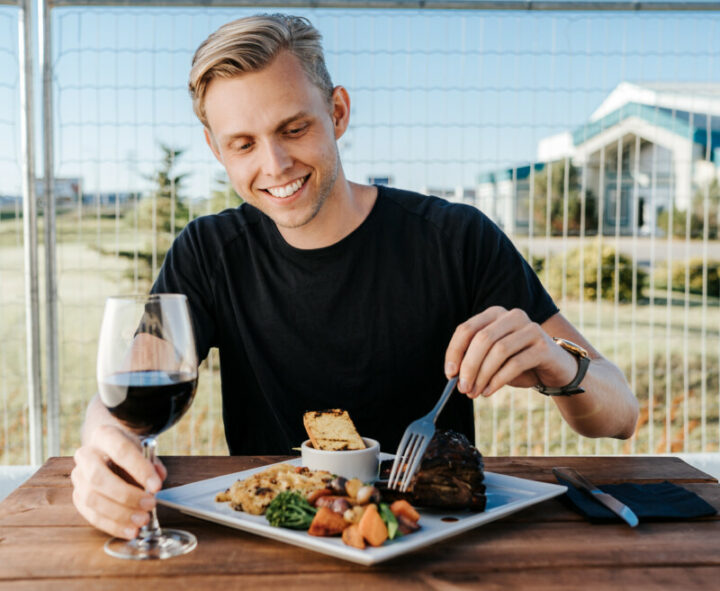 Enjoying food on a patio in Grande Prairie Region