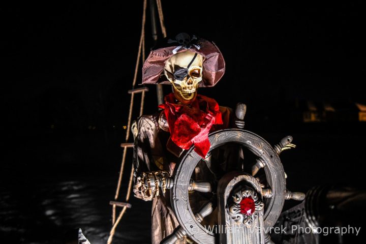 Skeleton steering a ship