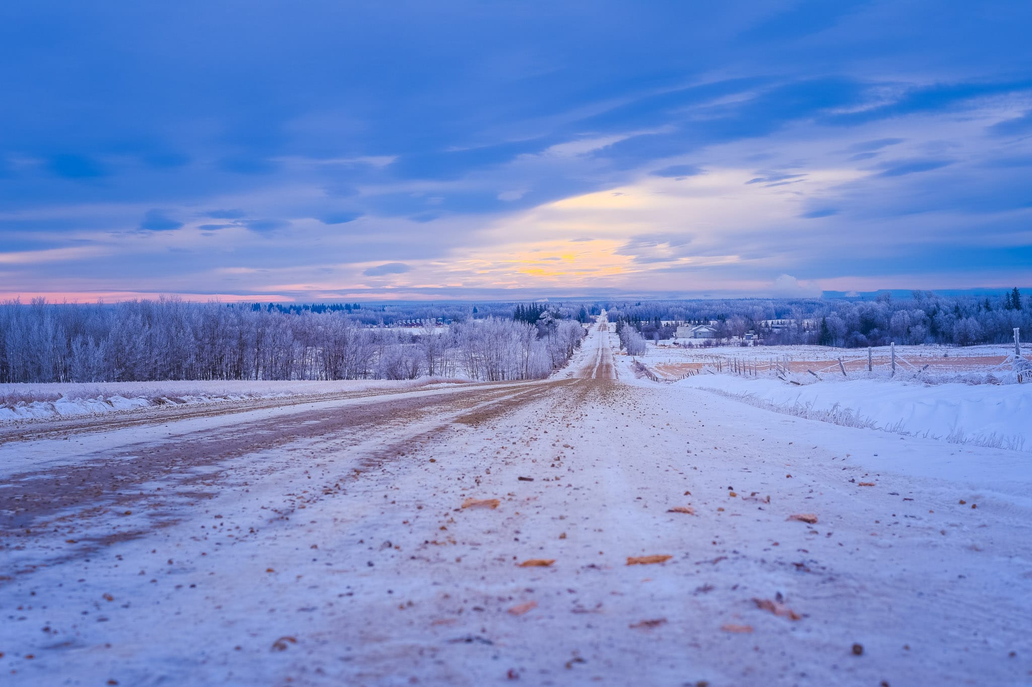 Winter road at sunset